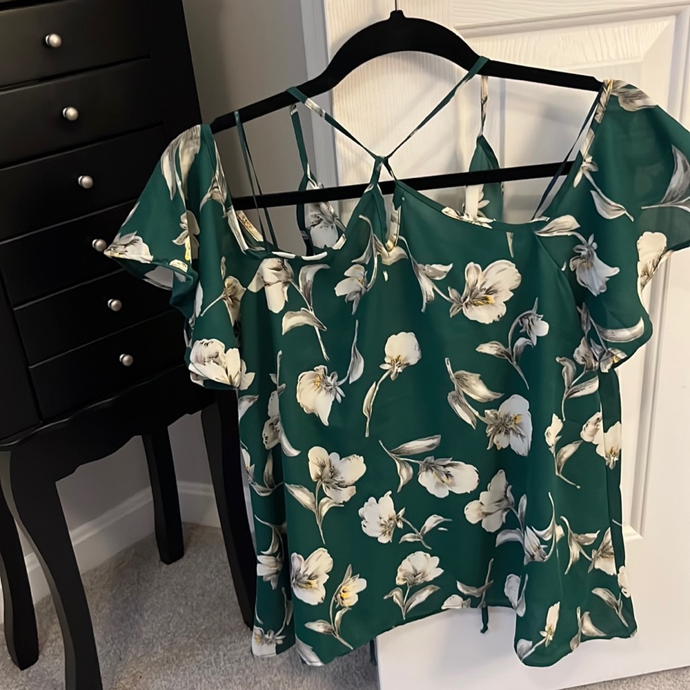 Women’s top New with tags. Off shoulder green with beige flowers.
